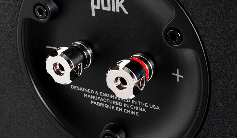 Soundbar sitting on a dresser.